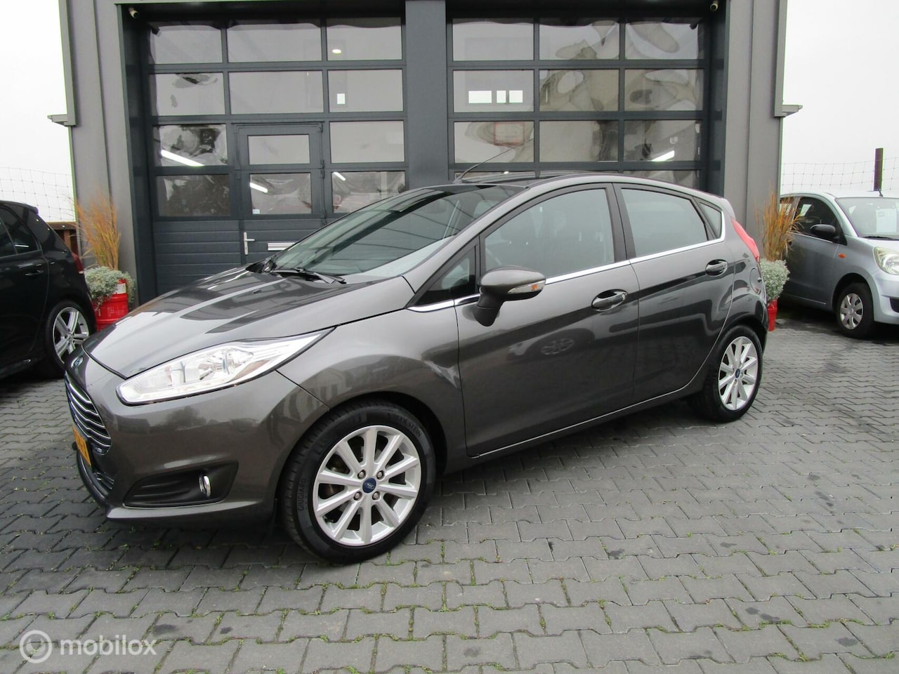 Ford Fiesta - 1.0 EcoBoost Titanium 5drs 1ste Eig 117dkm Trekhaak - AutoWereld.nl