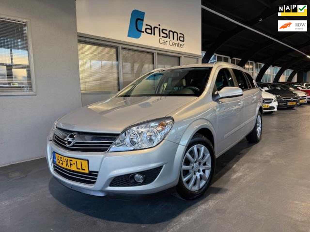 Opel Astra Wagon - 1.6 Temptation Cruise|Trekhaak|Airco - AutoWereld.nl