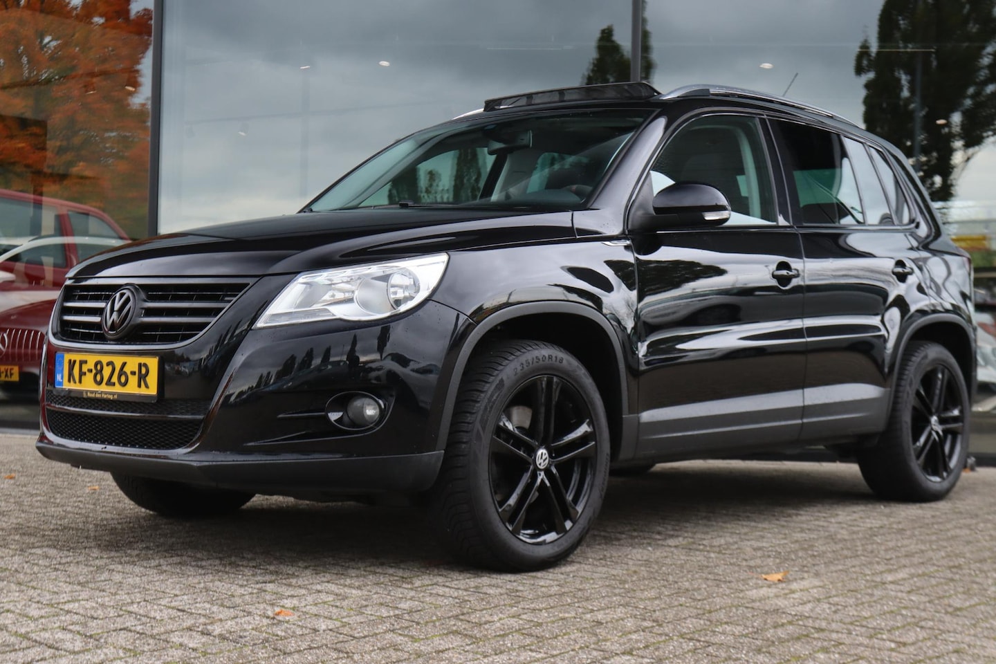 Volkswagen Tiguan - 2.0 TSI SPORT&STYLE 4MOTION | PANO | TREKHAAK | CRUISE | CLIMATE | PDC | - AutoWereld.nl