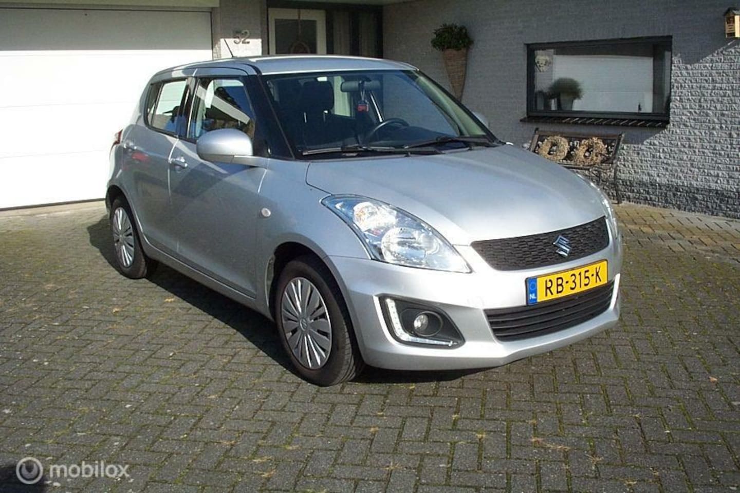 Suzuki Swift - 1.2 Style EASSS Airco Cruise Nieuwe APK - AutoWereld.nl