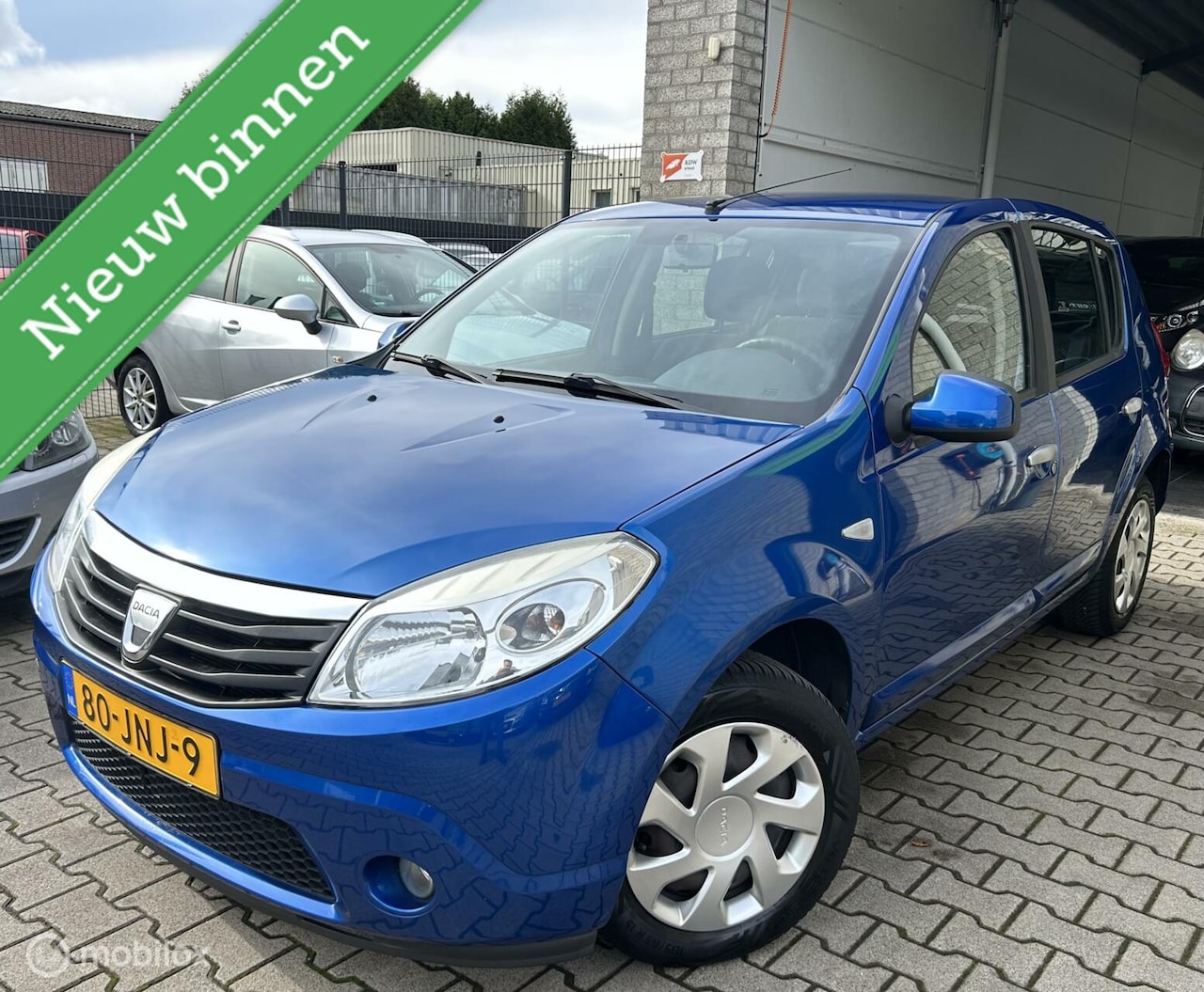 Dacia Sandero - 1.6 Lauréate / Sport uitvoering / Airco /N.A.P - AutoWereld.nl