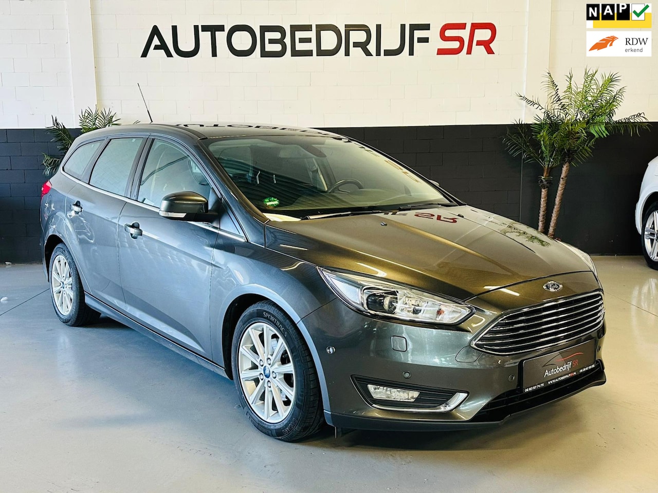 Ford Focus Wagon - 1.0 Titanium Xenon! Cruise Controle! Navigatie! Parkeersensoren! - AutoWereld.nl