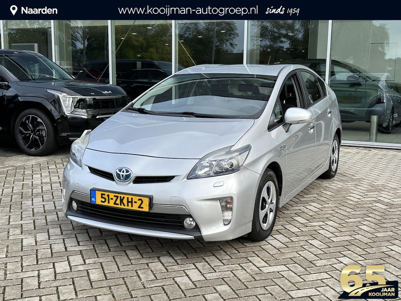 Toyota Prius - 1.8 Plug-in Dynamic Business | Stoelverwarming | achteruitrij camera | heads up display | - AutoWereld.nl