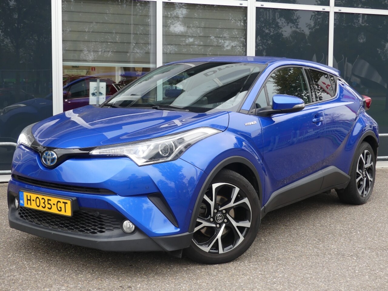 Toyota C-HR - 1.8 Hybrid Style | Navigatie | Trekhaak - AutoWereld.nl