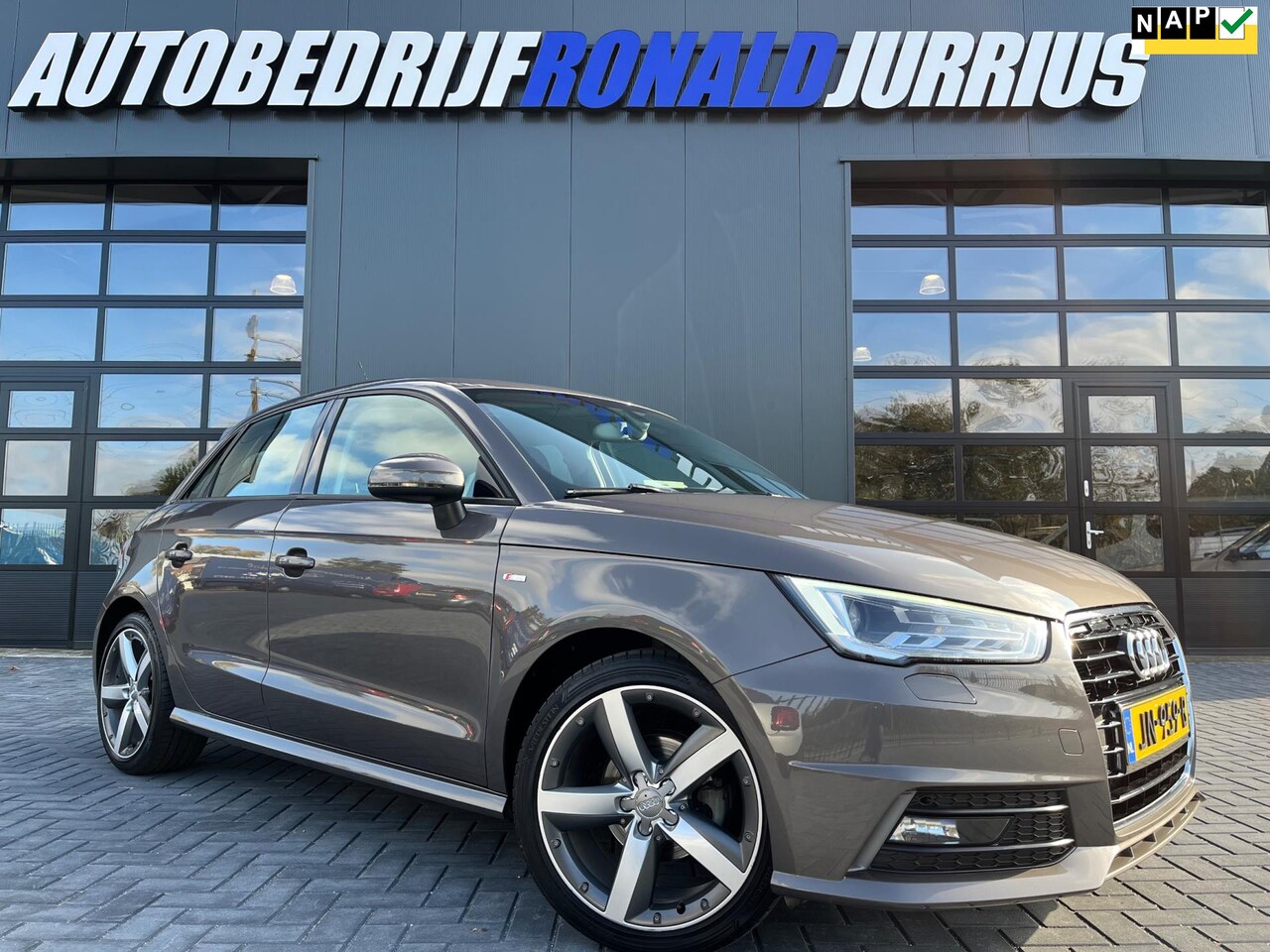 Audi A1 Sportback - 1.0 TFSI S-Line NL.Auto/Xenon/Led/Automaat/Navigatie/Cruise/17Inch/Goed Onderhouden - AutoWereld.nl