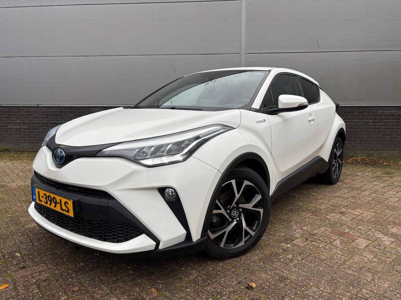 Toyota C-HR - 1.8 Hybrid Style JBL  Navigatie Parkeercamera - AutoWereld.nl