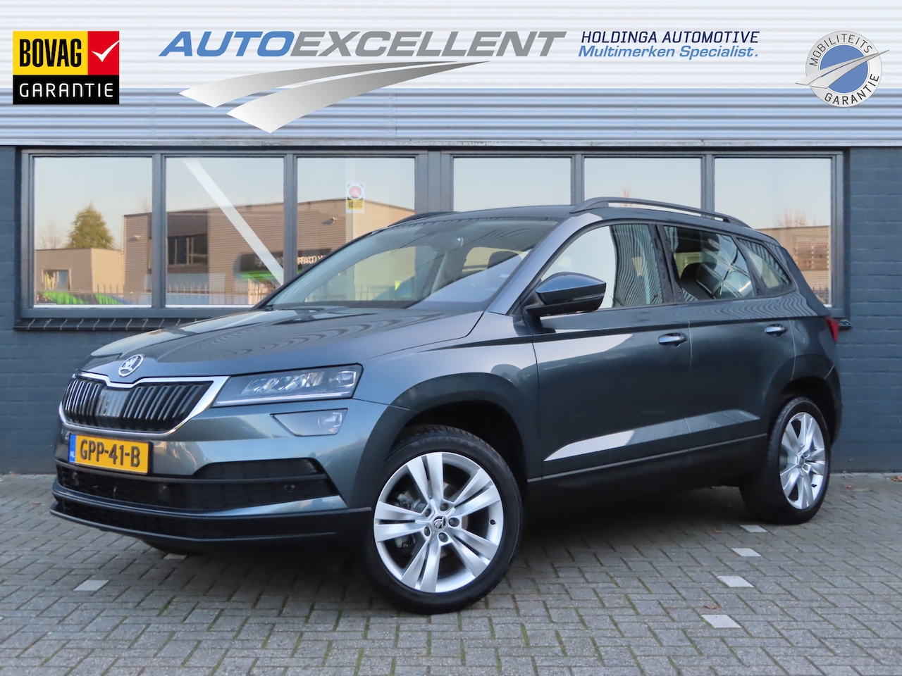 Skoda Karoq - 1.5 TSI ACT Style DSG | wegklapbare trekhaak | stoelverwarming | parkeersensoren voor + ac - AutoWereld.nl