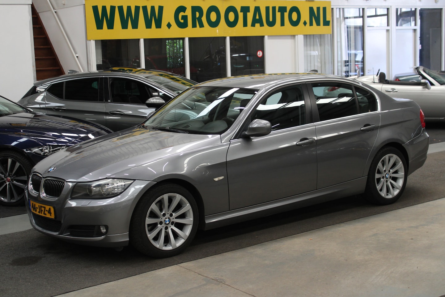 BMW 3-serie - 320i Business Line Automaat Airco, Cruise Control, Isofix, Stuurbekrachtiging - AutoWereld.nl