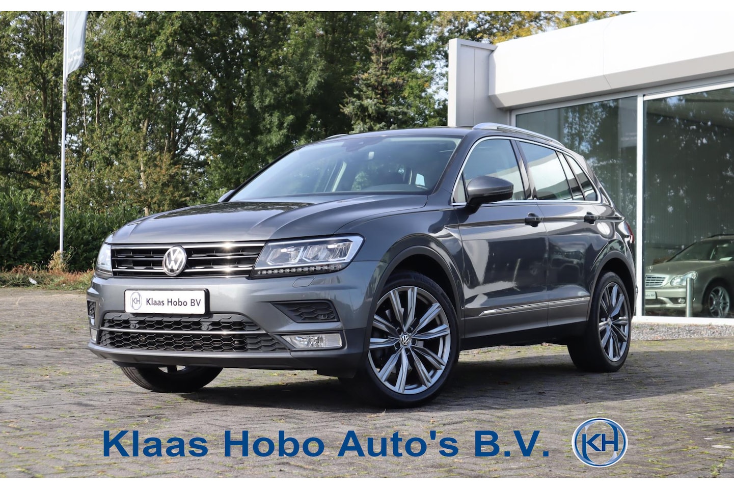 Volkswagen Tiguan - 2.0 TSI 4Motion Highline Pano, Adaptive Cruise, Stoel/stuur verwarming, Dynaudio - AutoWereld.nl