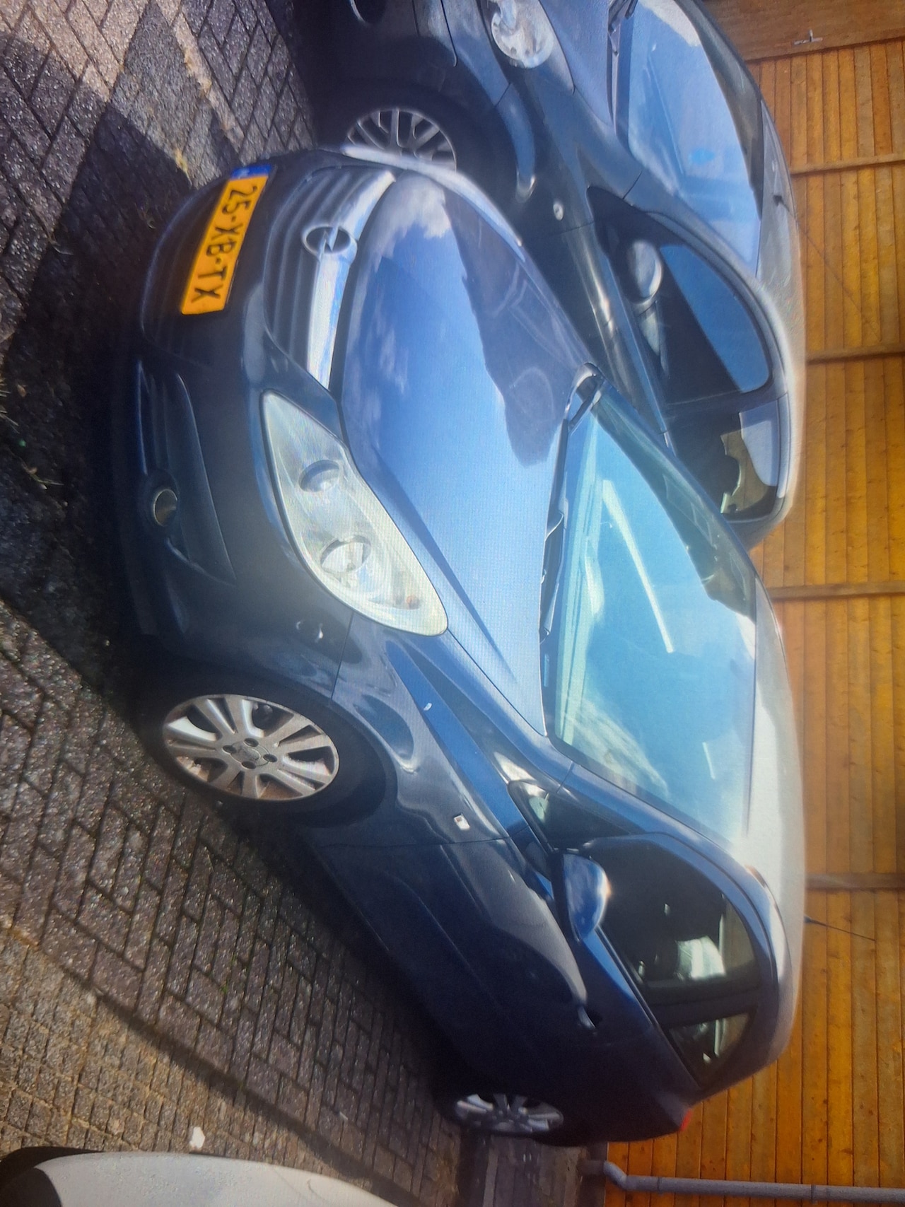 Opel Corsa - 1.2-16V Enjoy - AutoWereld.nl