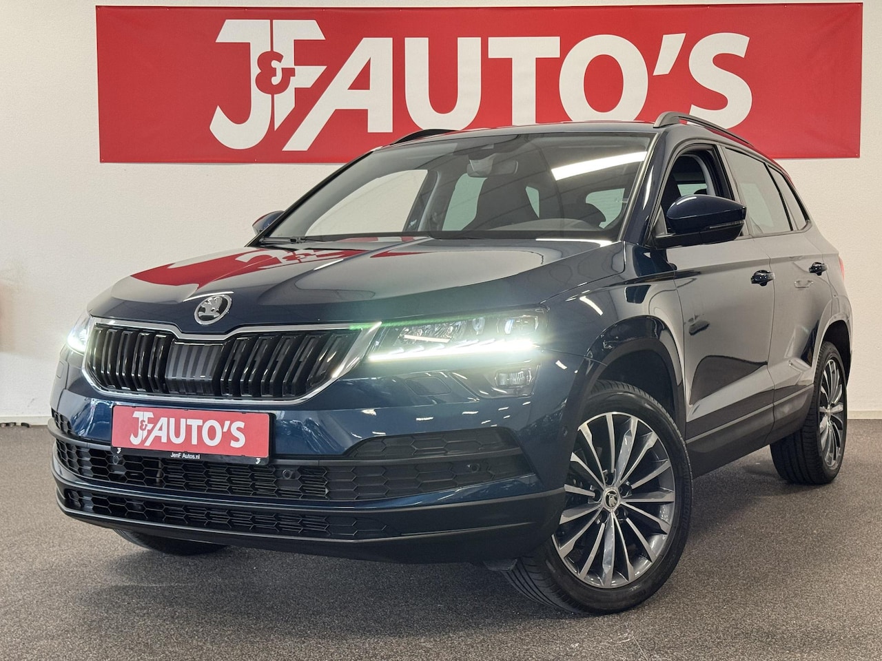 Skoda Karoq - 1.5 TSI ACT Style NAVIGATIE/CAMERA, ECC AIRCO, CRUISE - AutoWereld.nl