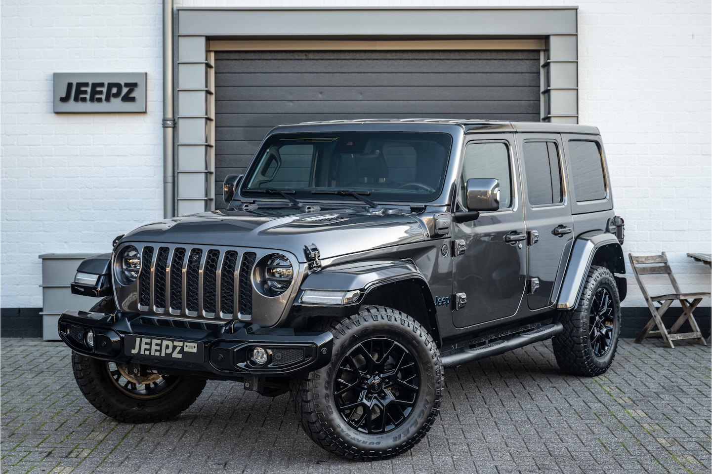 Jeep Wrangler Unlimited - 4xe 380 Sahara - Ofd bumper - AutoWereld.nl