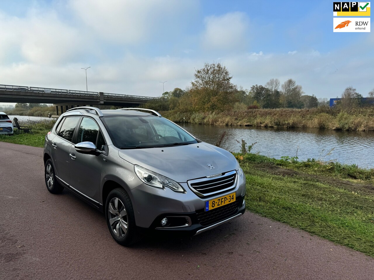 Peugeot 2008 - 1.2 PureTech Style|Pano|Dis=V.V|Dealer Onder.| - AutoWereld.nl