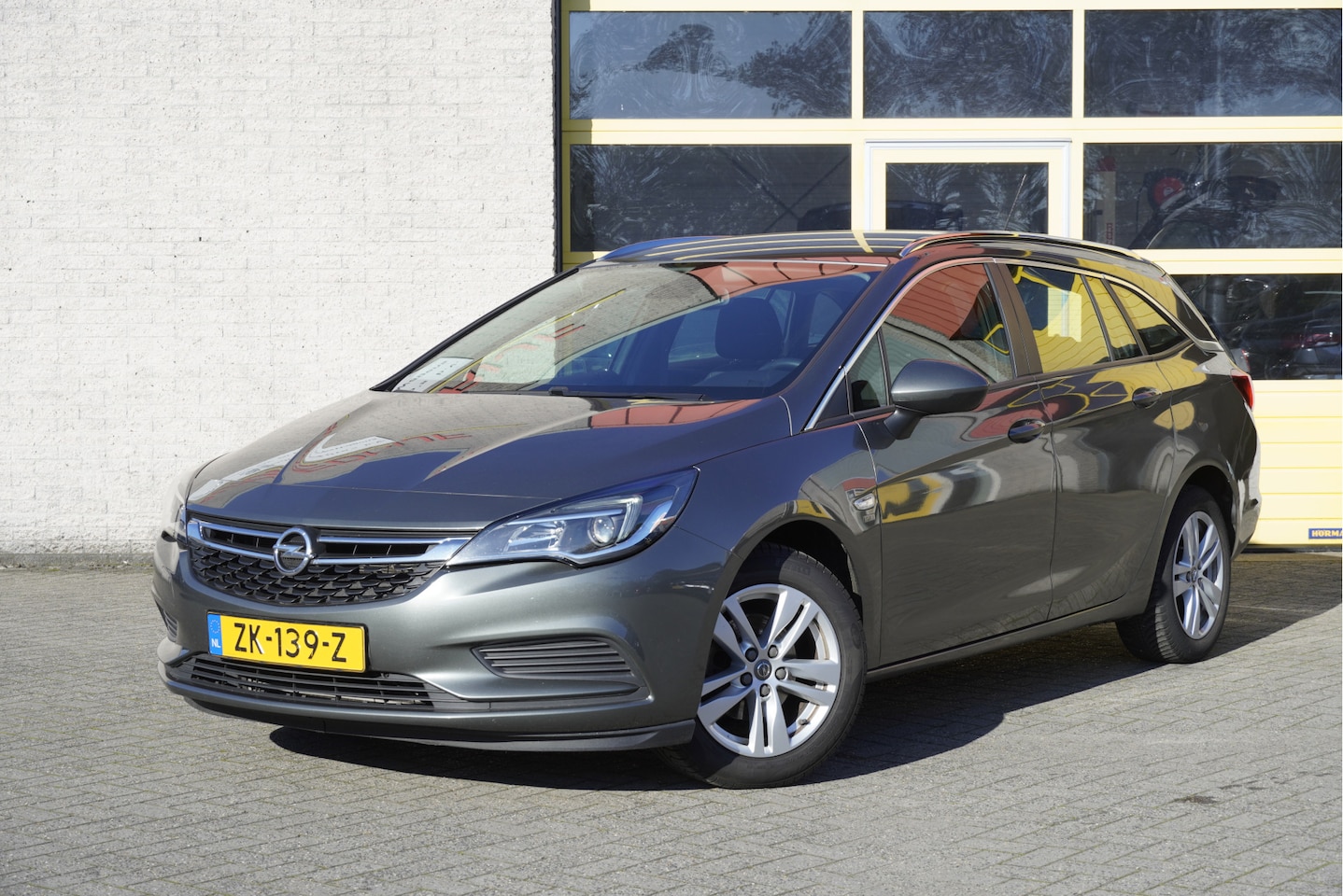 Opel Astra Sports Tourer - 1.4 Turbo 150PK! Automaat 120 Jaar Edition BJ2019 Lmv 16" | Led | Trekhaak | Navi | Airco - AutoWereld.nl