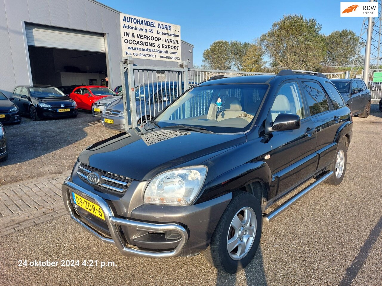 Kia Sportage - 2.0 CVVT Executive 2.0 CVVT Executive - AutoWereld.nl