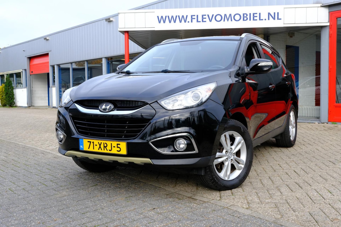 Hyundai ix35 - 1.6i GDI Business Edition Navi|Half Leder|Clima|LMV - AutoWereld.nl