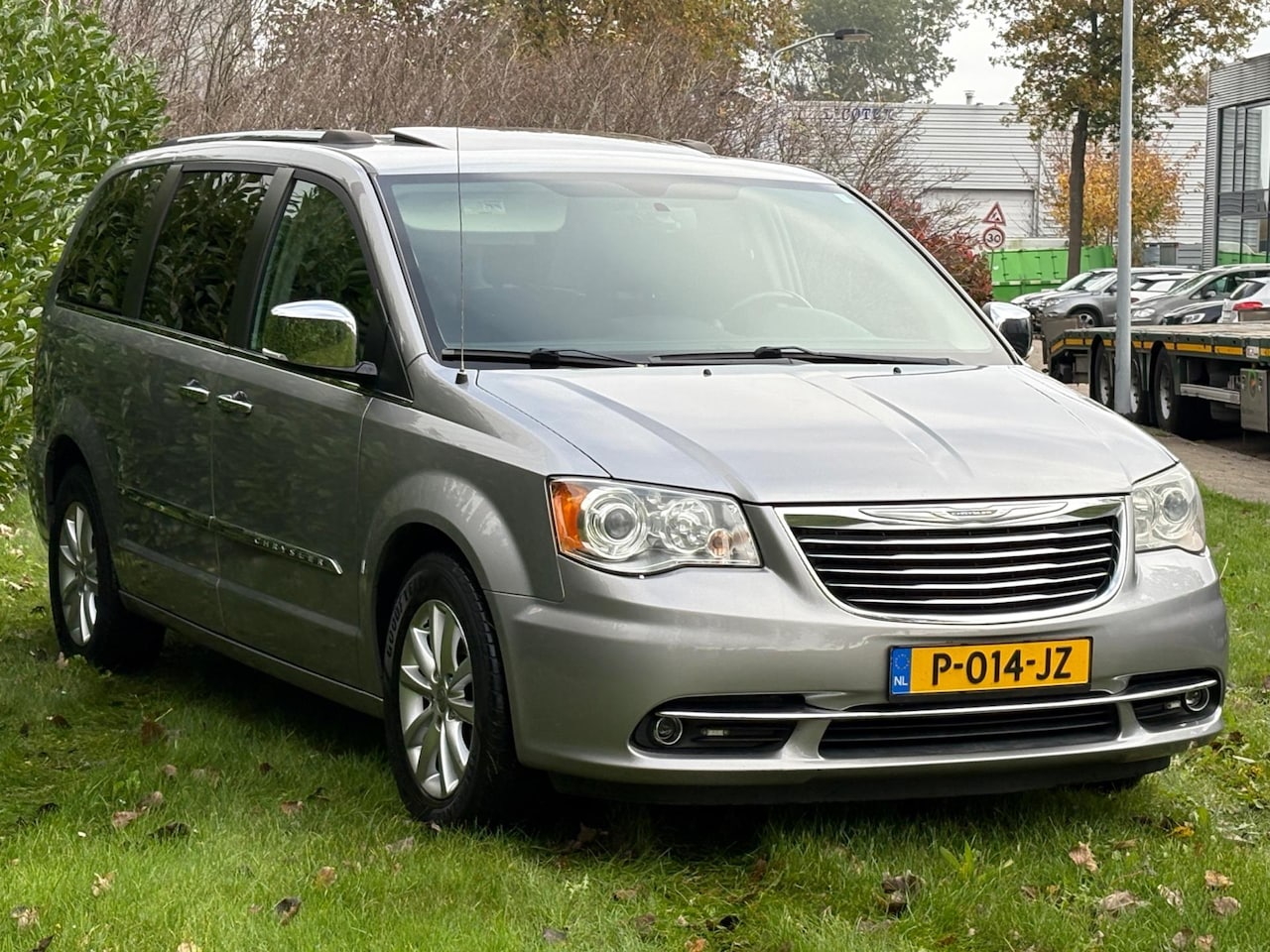 Chrysler Grand Voyager - 3.6 V6 Stow&Go/Limited/3XTV/DVD - AutoWereld.nl