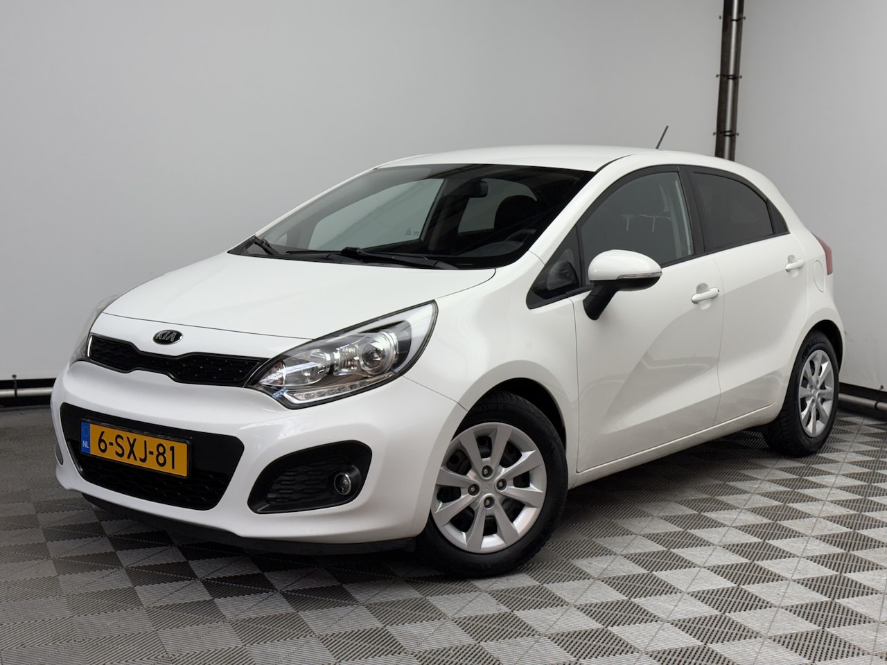 Kia Rio - 1.2 CVVT Plus Pack 5-drs Airco NL Auto - AutoWereld.nl