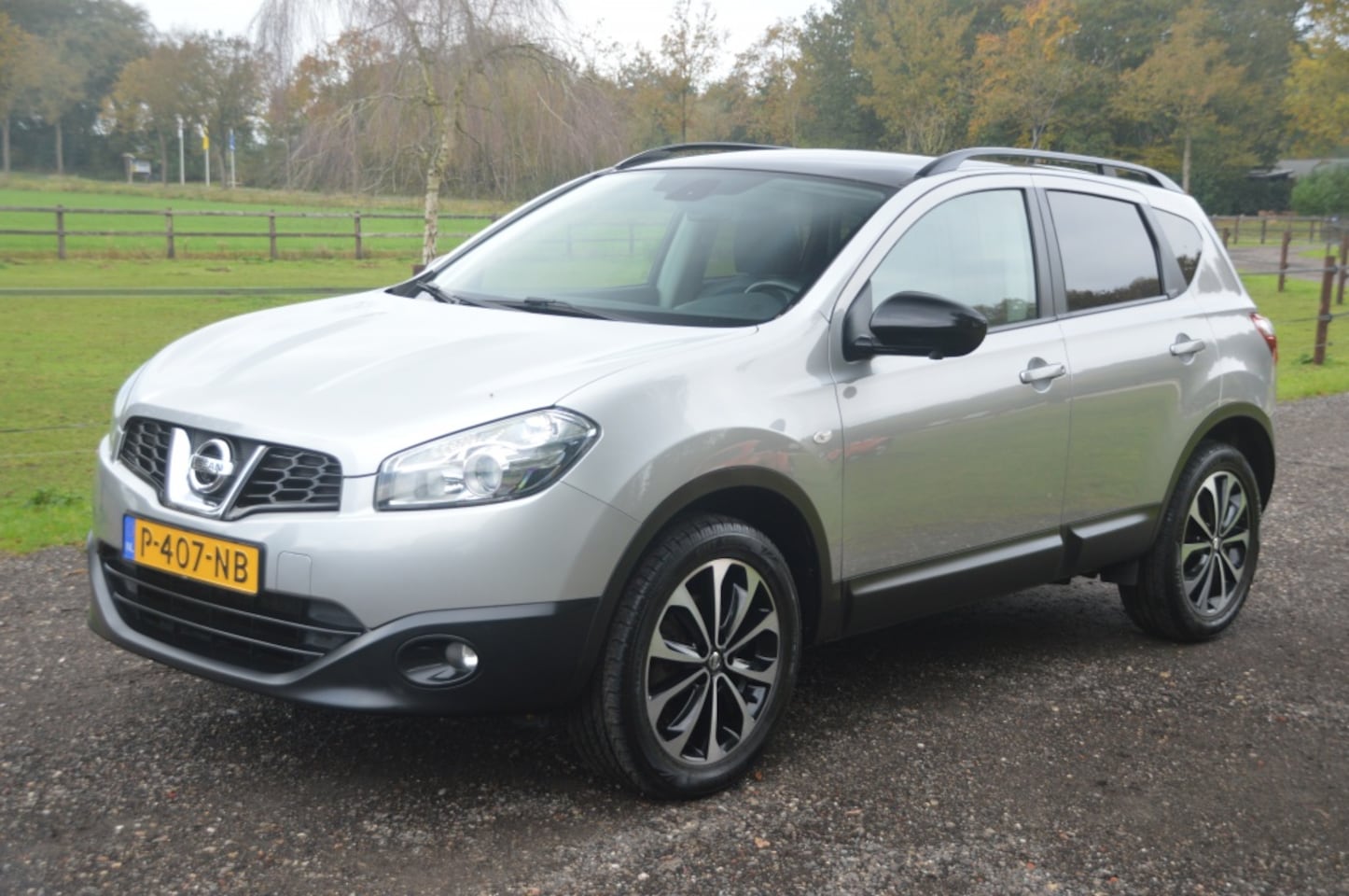 Nissan Qashqai - 1.6 Acenta Clima Cruise Pano dak 360 18inch - AutoWereld.nl