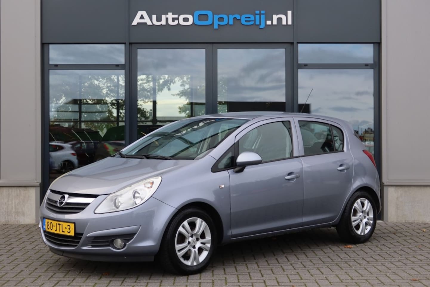 Opel Corsa - 1.2 16V Enjoy AUTOMAAT 5drs. Airco, LM-Velgen - AutoWereld.nl