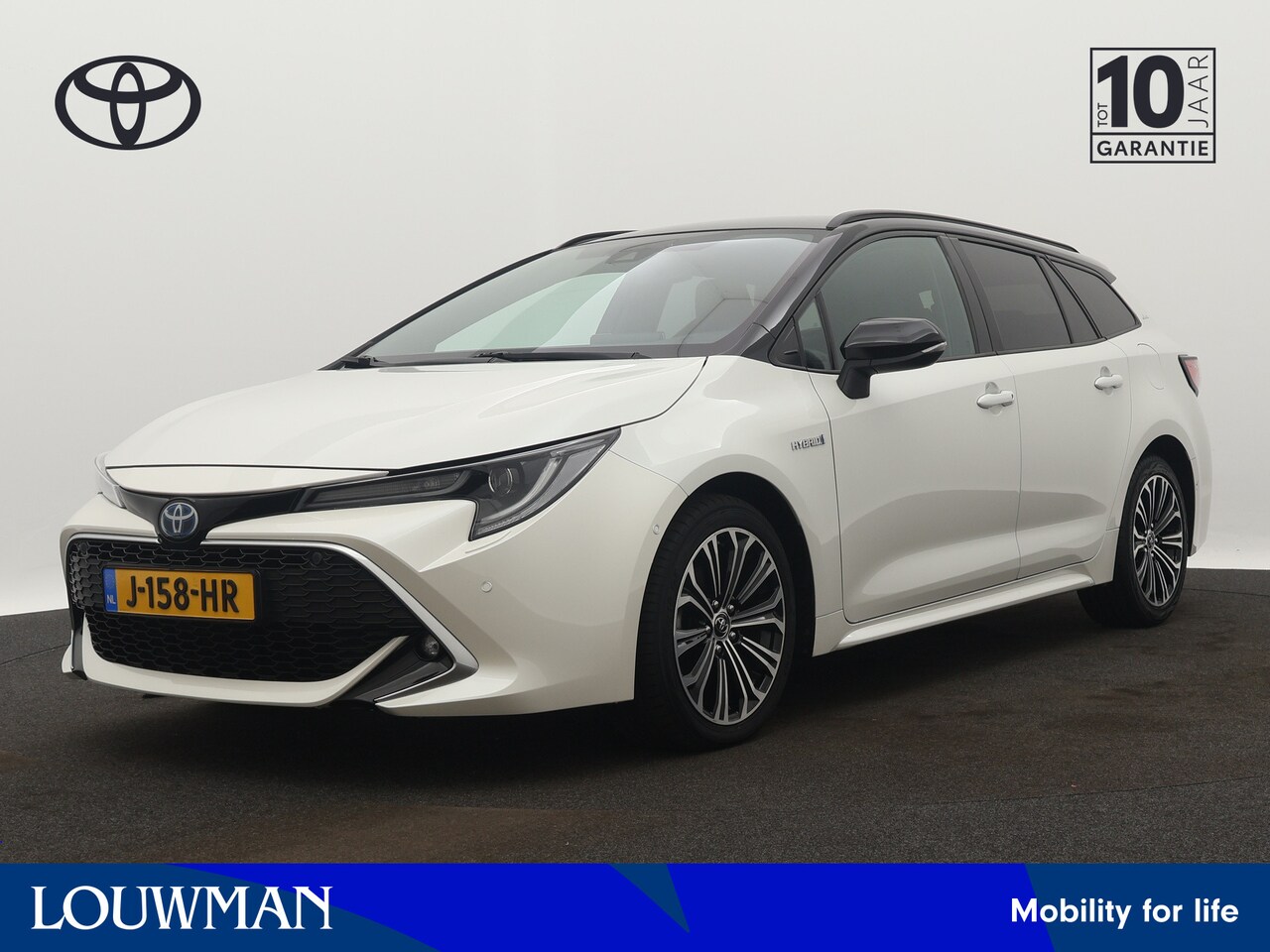 Toyota Corolla Touring Sports - 1.8 Hybrid Executive Limited | Bi-tone | Winter Pack | Half lederen bekleding | Navigatie - AutoWereld.nl