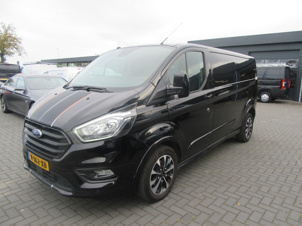 Ford Transit Custom - 310 2.0 TDCI L2H1 Sport 310 2.0 TDCI L2H1 Sport, Navigatie, Camera, Trekhaak - AutoWereld.nl