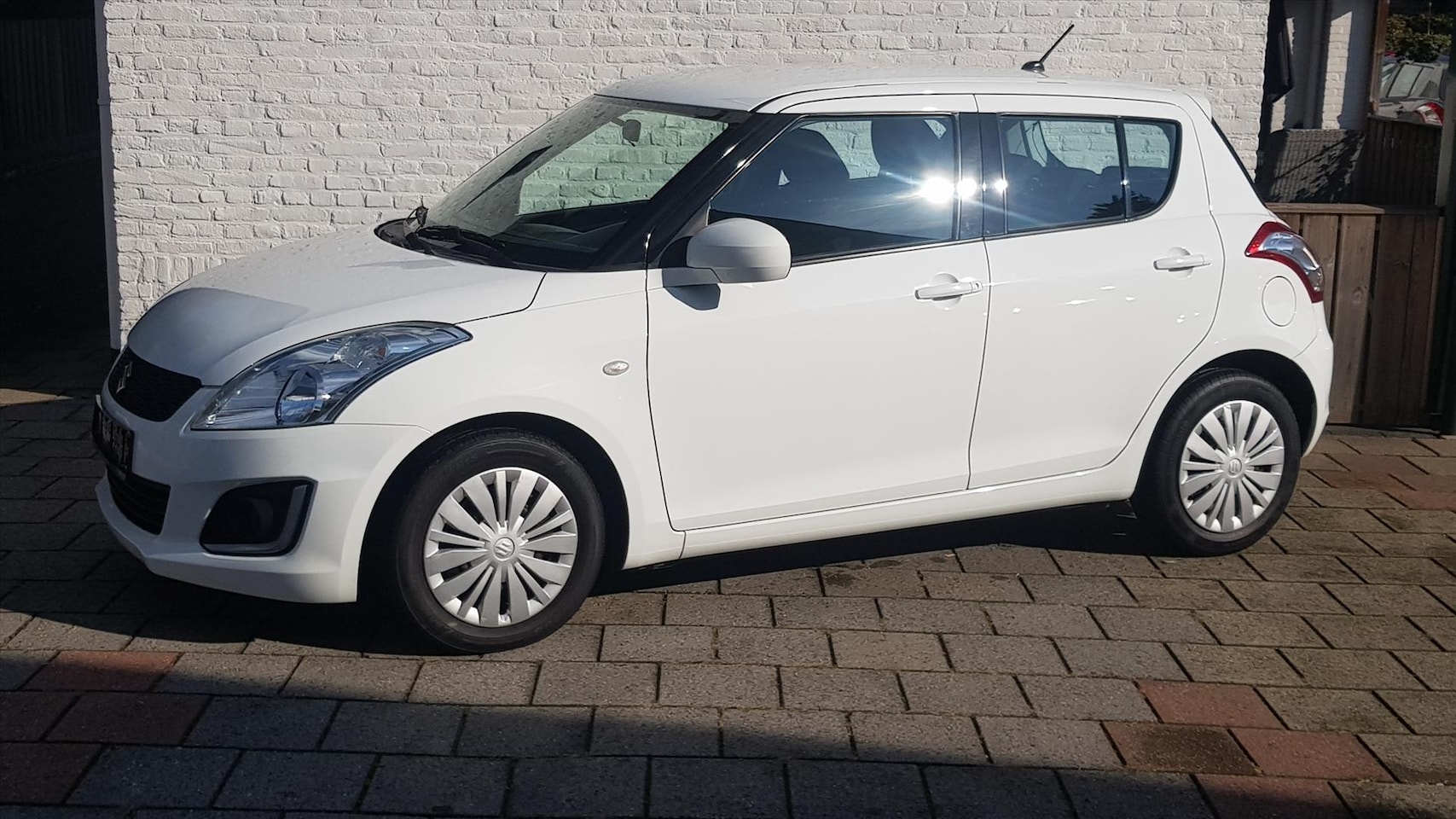 Suzuki Swift - 1.2 5drs comfort model 2014 airco - AutoWereld.nl