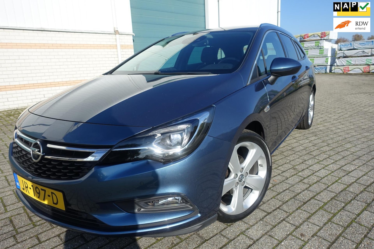 Opel Astra Sports Tourer - 1.4 Innovation - trekhaak - 4 nieuwe 18"all seasson banden - navi - - AutoWereld.nl