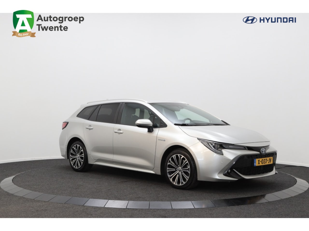 Toyota Corolla Touring Sports - 2.0 Hybrid GR-Sport | Carplay | Airco | Cruise Control | - AutoWereld.nl