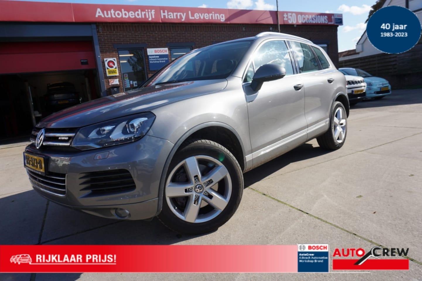 Volkswagen Touareg - 3.0 V6 TSI 380pk Hybrid 8-tiptronic Highline Leer Navigatie - AutoWereld.nl