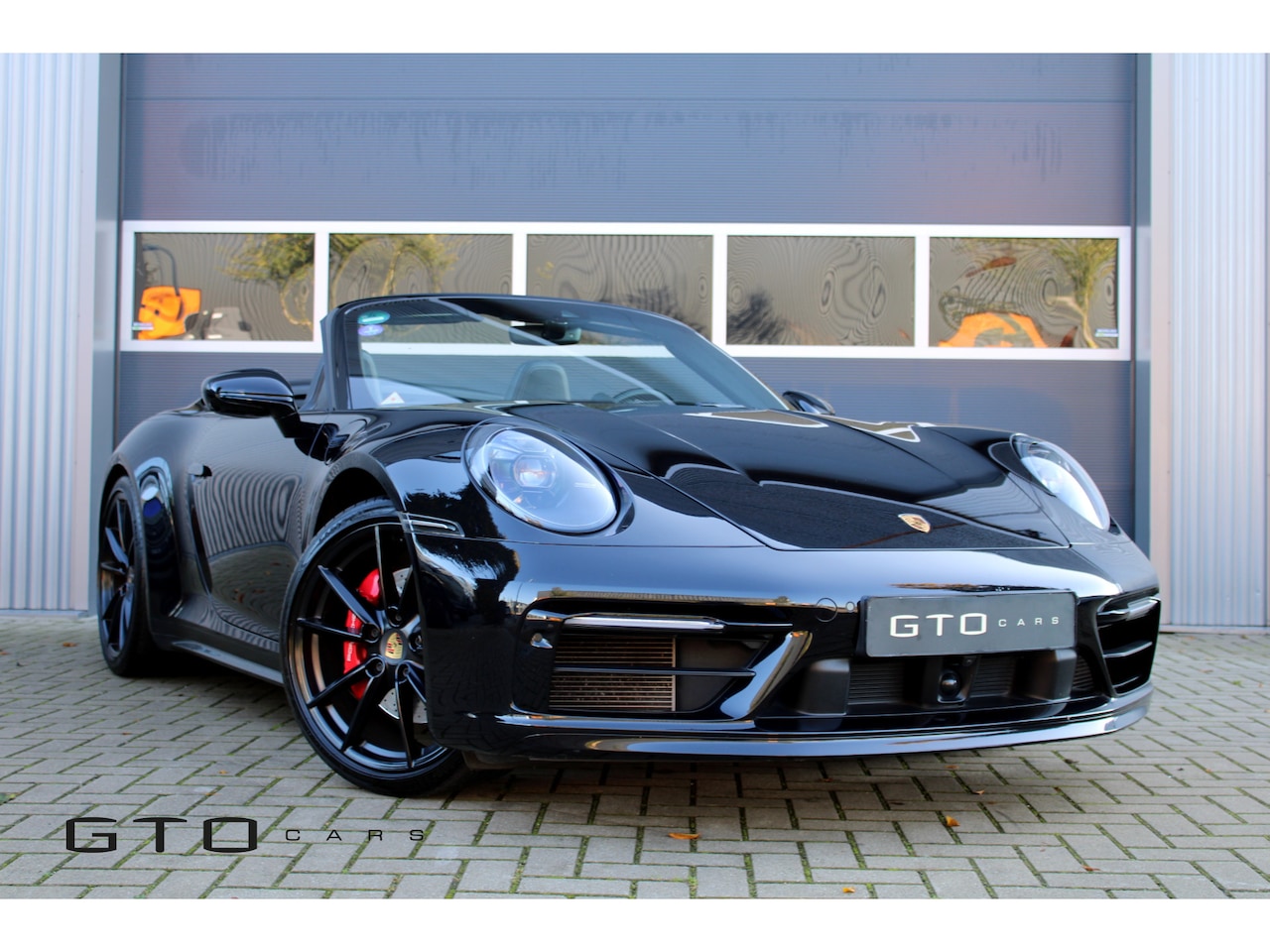 Porsche 911 Cabrio - 992 Carrera 3.0 4S Carbon / Lift / Surround Camera / Sportdesign / Sportchrono / Stoelvent - AutoWereld.nl