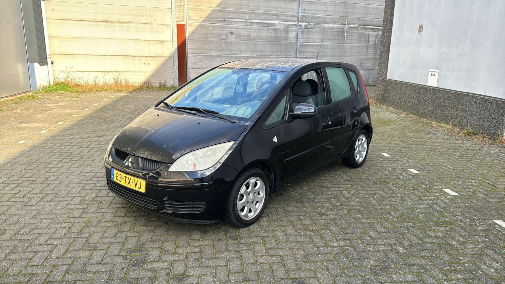 Mitsubishi Colt - 1.3 Invite 107.000 NAP AUTOMAAT AIRCO ZWART 2007 - AutoWereld.nl