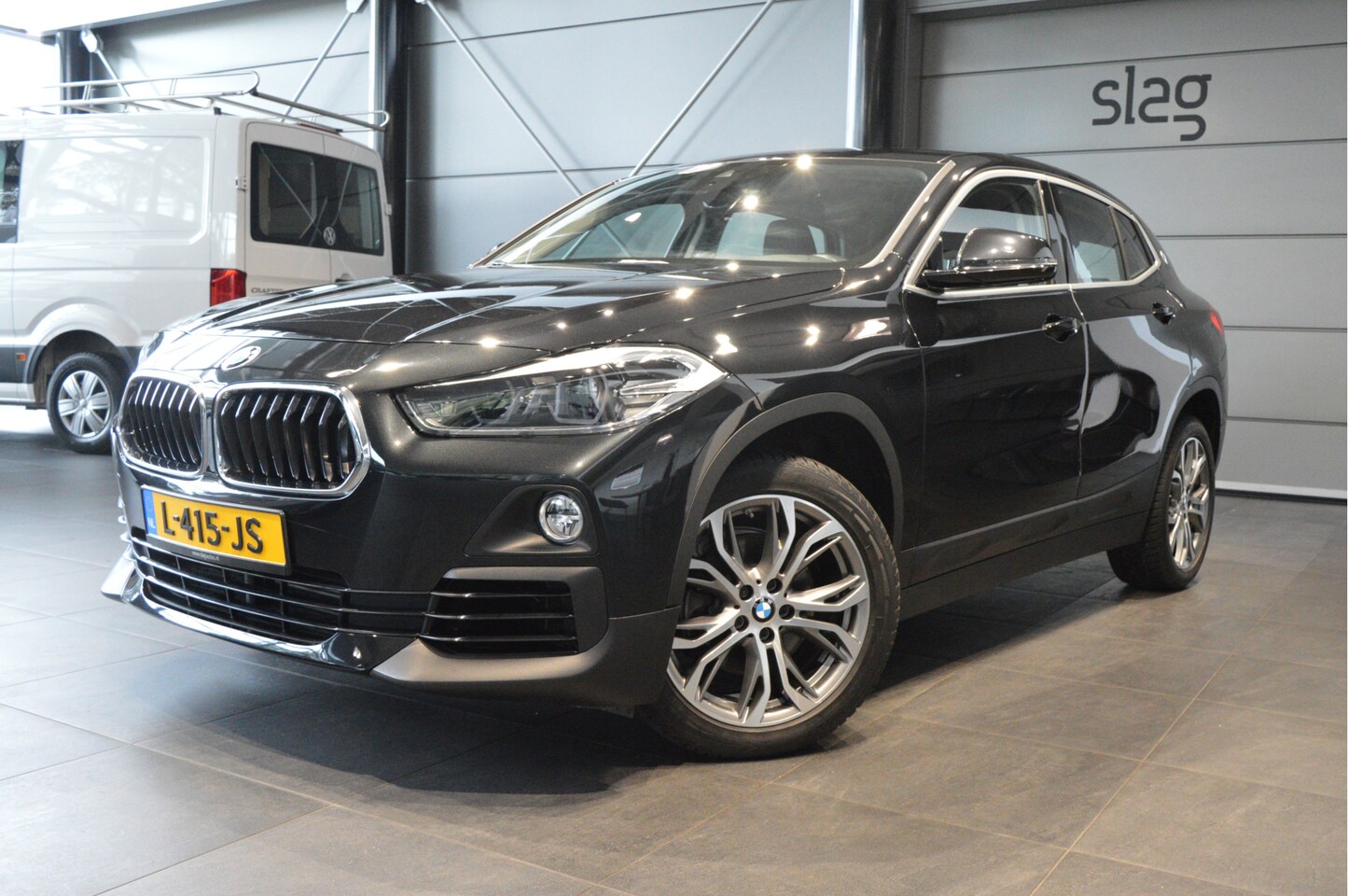 BMW X2 - sDrive18i High Executive navi clima cruise led pdc 18 inch !! - AutoWereld.nl