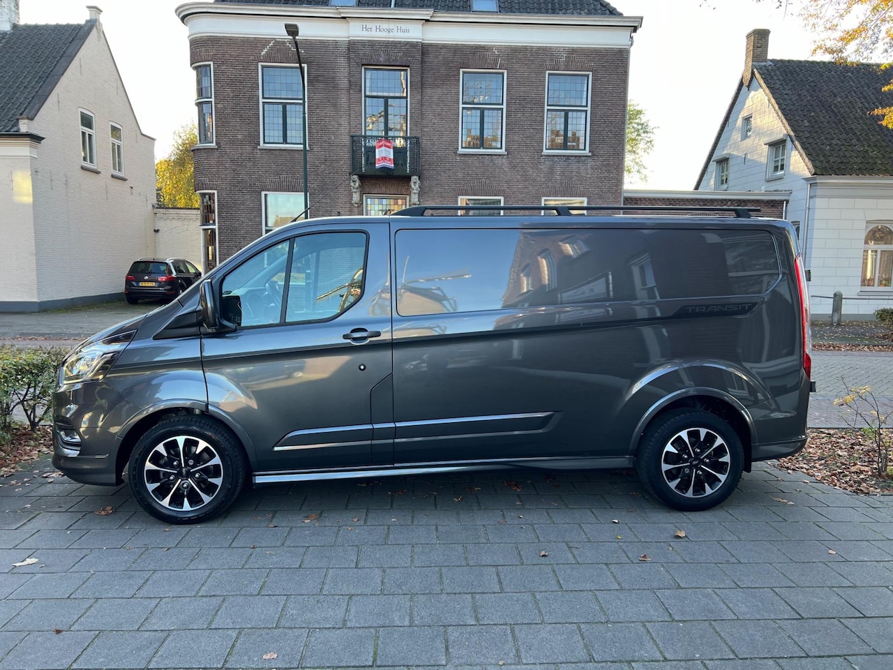 Ford Transit Custom - 310 2.0 TDCI L2H1 SPORT RAPTOR EERSTE EIGENAAR AUTOMAAT 170 PK LEER NIEUWSTAAT - AutoWereld.nl