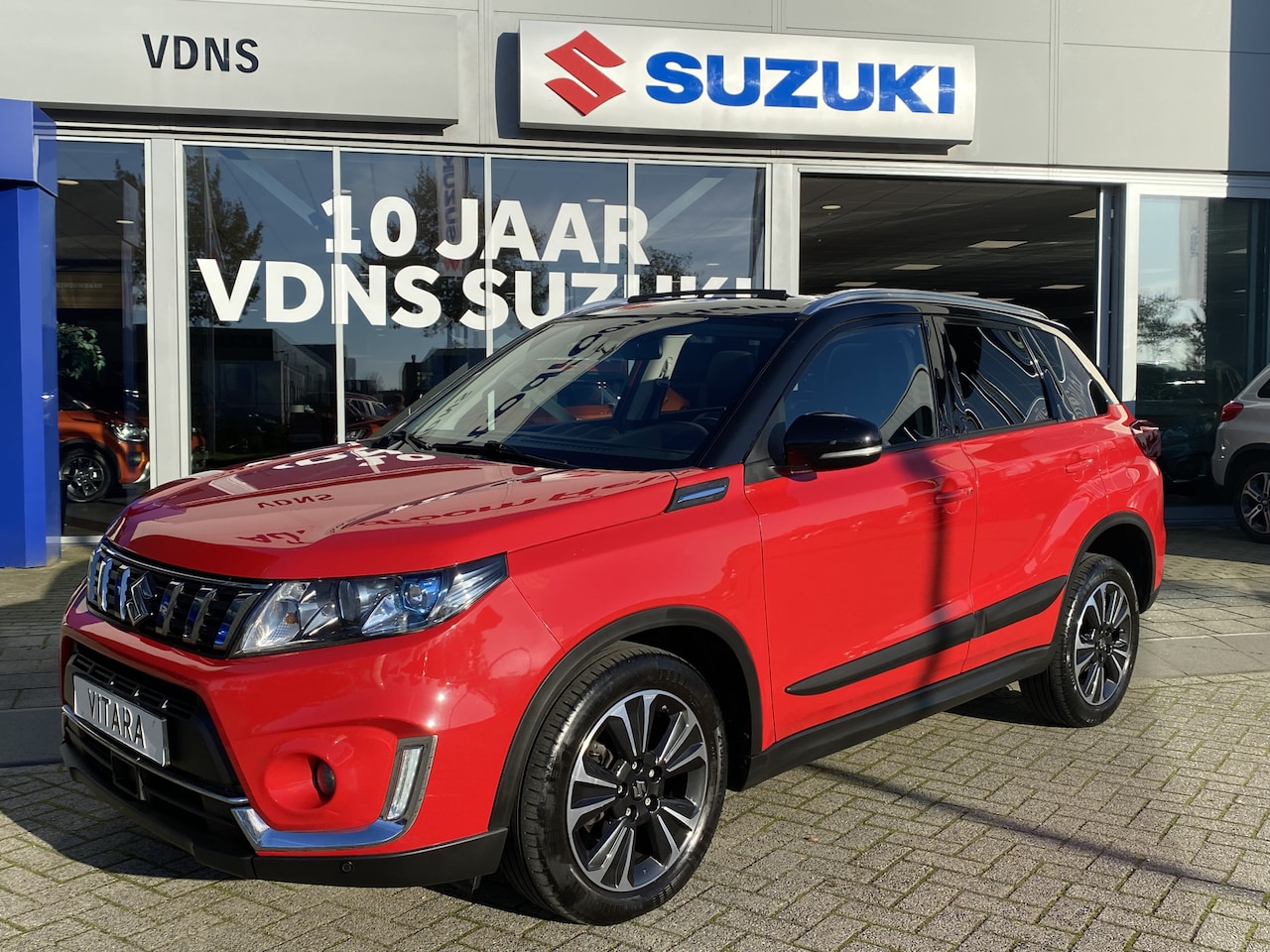 Suzuki Vitara - 1.4 Boosterjet Stijl Navigatie Cruise Control Achteruitrijcamera info: 0492588976 - AutoWereld.nl