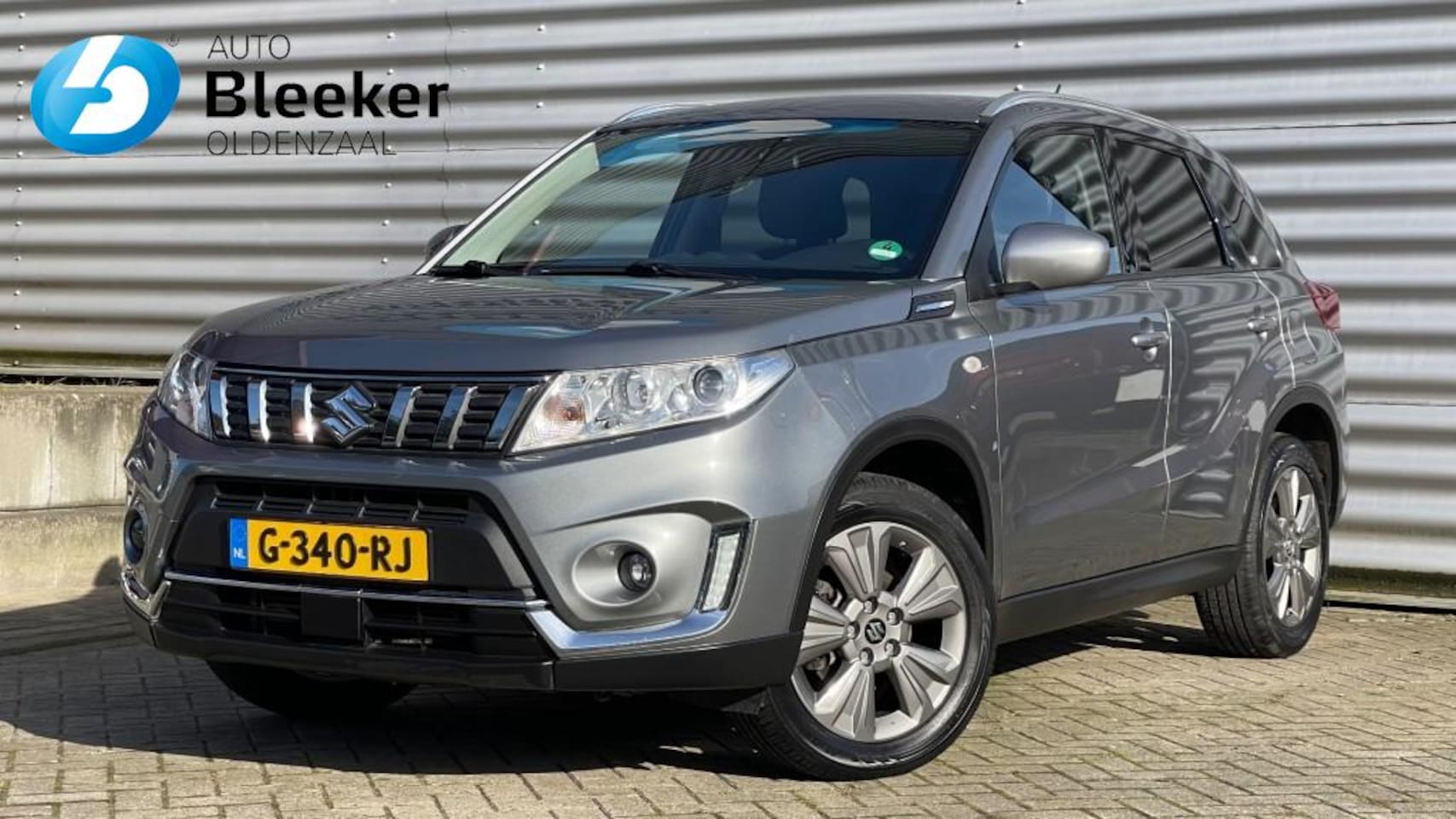 Suzuki Vitara - 1.0 B.JET Allgrip Select Airco Camera Cruise Navi Trekhaak - AutoWereld.nl