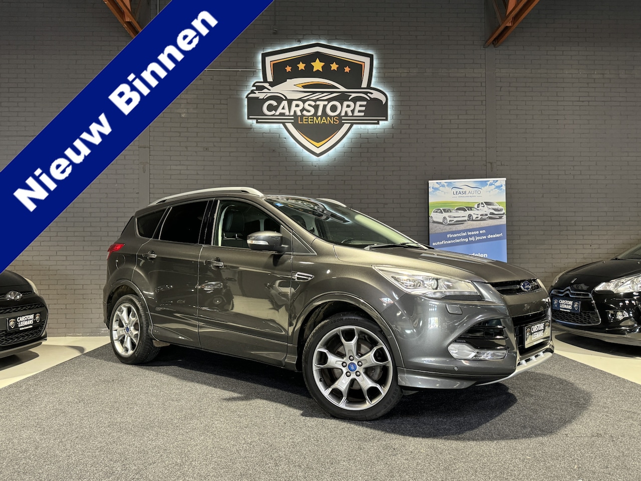 Ford Kuga - 1.5 Titanium Plus ClimaC.CruiseC.Key.Navi.Pdc.Cam.LMV!!! - AutoWereld.nl