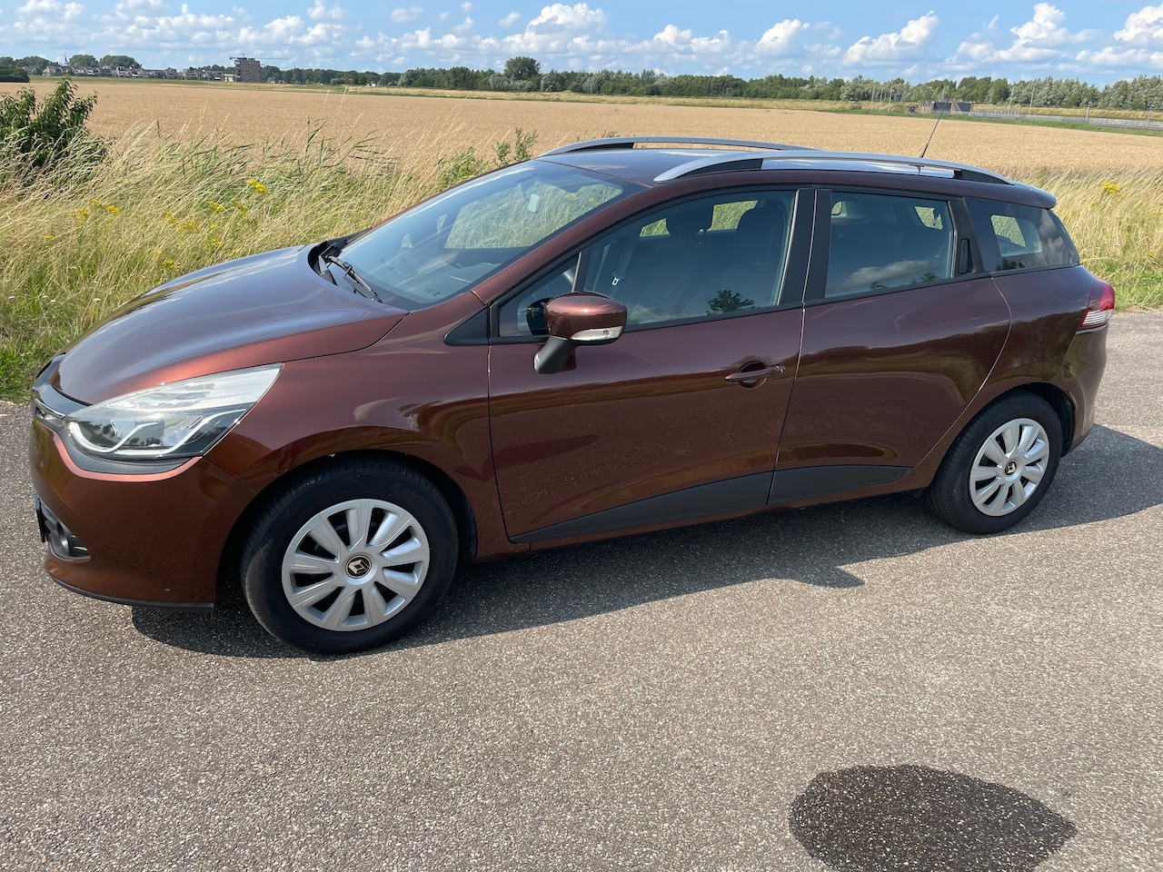 Renault Clio Estate - 0.9 TCe Expression Navi, Cruise, Airco, slechts 1 eigenaar! - AutoWereld.nl