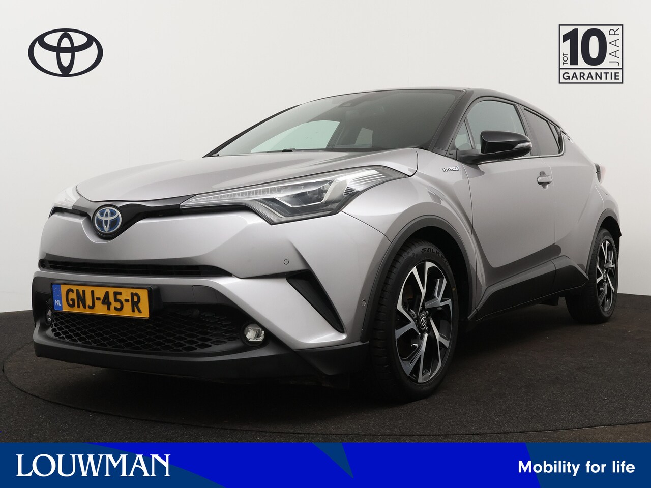 Toyota C-HR - 1.8 Hybrid Bi-tone | Navigatie | JBL-audio | Stoel- en stuurverwarming | - AutoWereld.nl