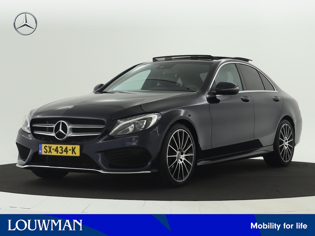 Mercedes-Benz C-klasse - 180 AMG Sportpakket | Panoramadak | Leder | Dode Hoek Ass | Comand Navigatie | Parkeerpakk - AutoWereld.nl