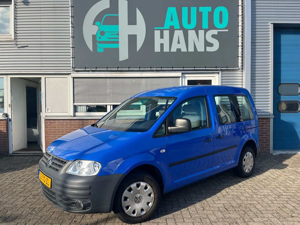 Volkswagen Caddy - 1.6 Optive Comfort 5p. | airco | trekhaak | beurt + APK - AutoWereld.nl