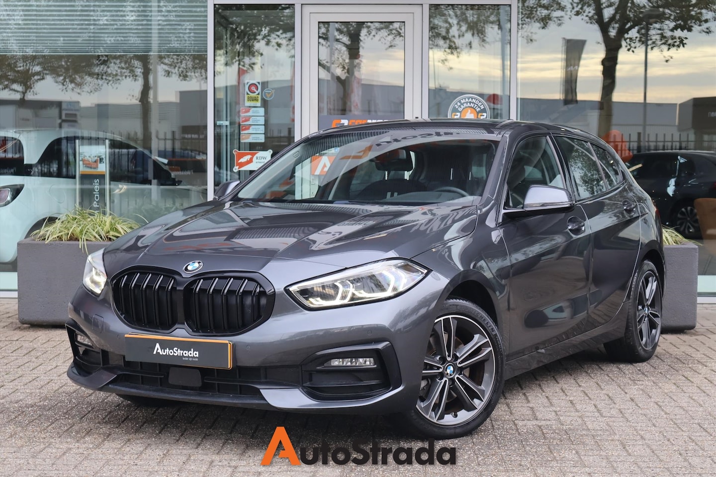 BMW 1-serie - (f40) 118i 140PK High Executive SportLine I Navi I Climate I Cruise I 1e eigenaar - AutoWereld.nl