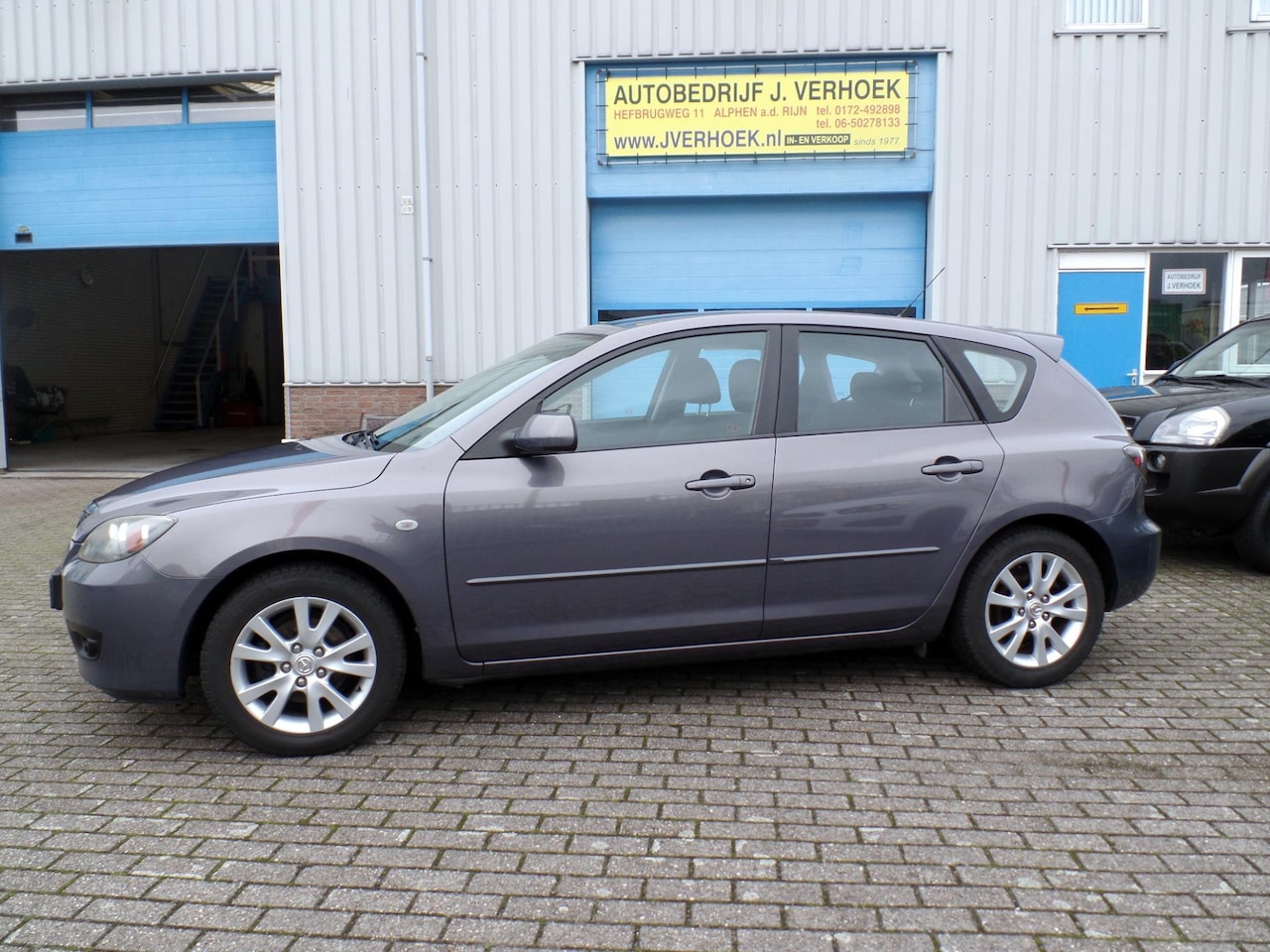 Mazda 3 Sport - 1.6 Touring climate control - AutoWereld.nl