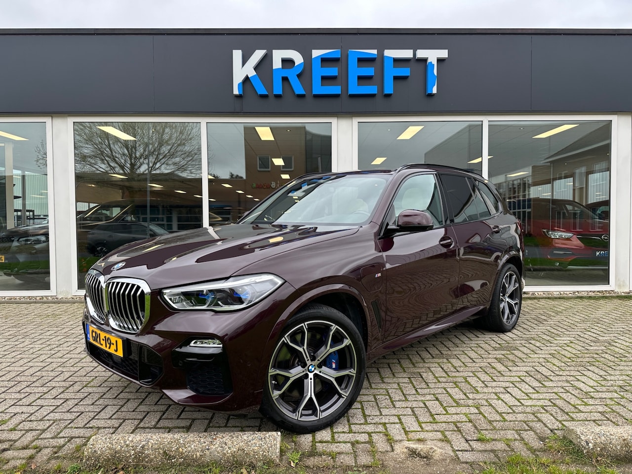 BMW X5 - xDrive45e High Executive Violet | M Sport | Lucht | Hud - AutoWereld.nl