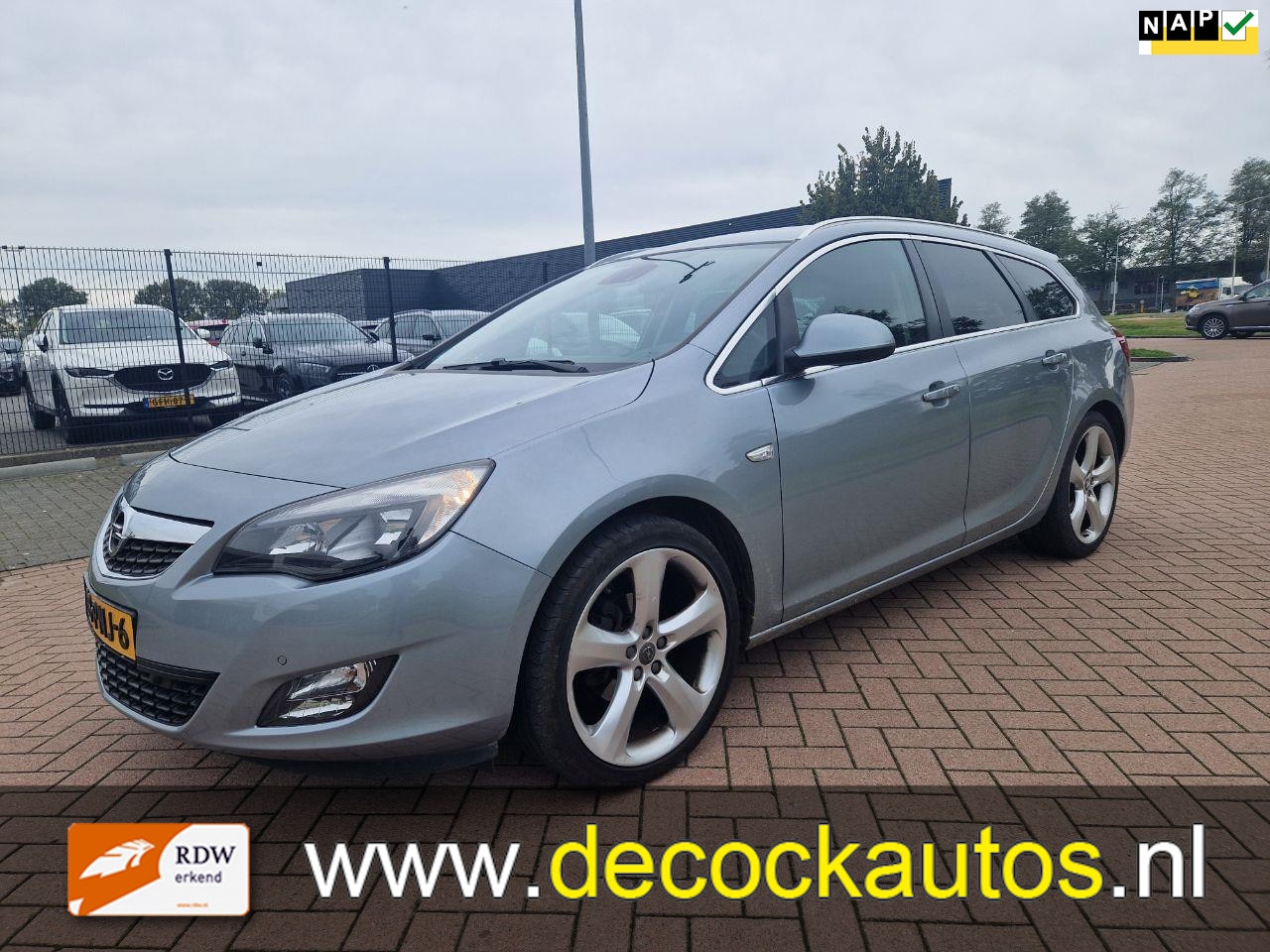 Opel Astra Sports Tourer - 1.4 Turbo Sport/CLIMA/TREKHAAK - AutoWereld.nl