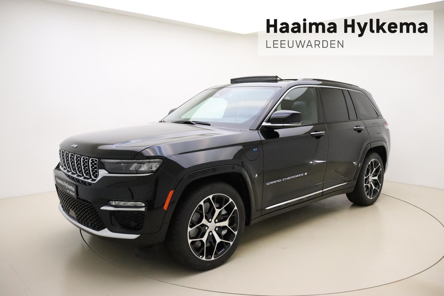 Jeep Grand Cherokee - 2.0 Summit Reserve 4xe | Luchtvering | Panoramadak | Lederen bekleding | Passenger display - AutoWereld.nl