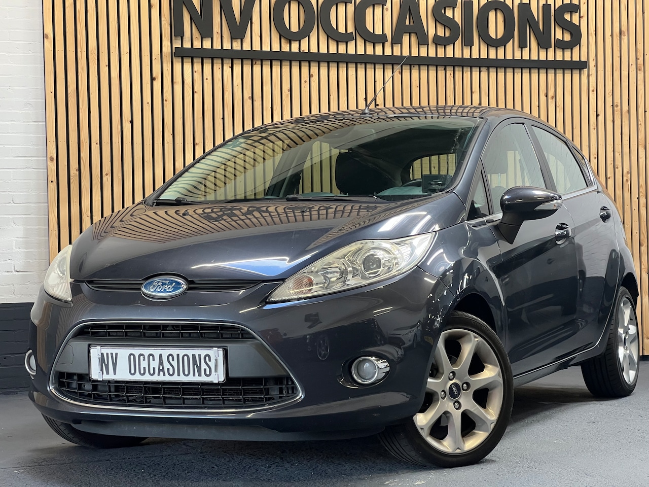 Ford Fiesta - 1.25 Titanium ECC/VOORRUITVW/PDC/NAVI/CRUISECNTRL! - AutoWereld.nl