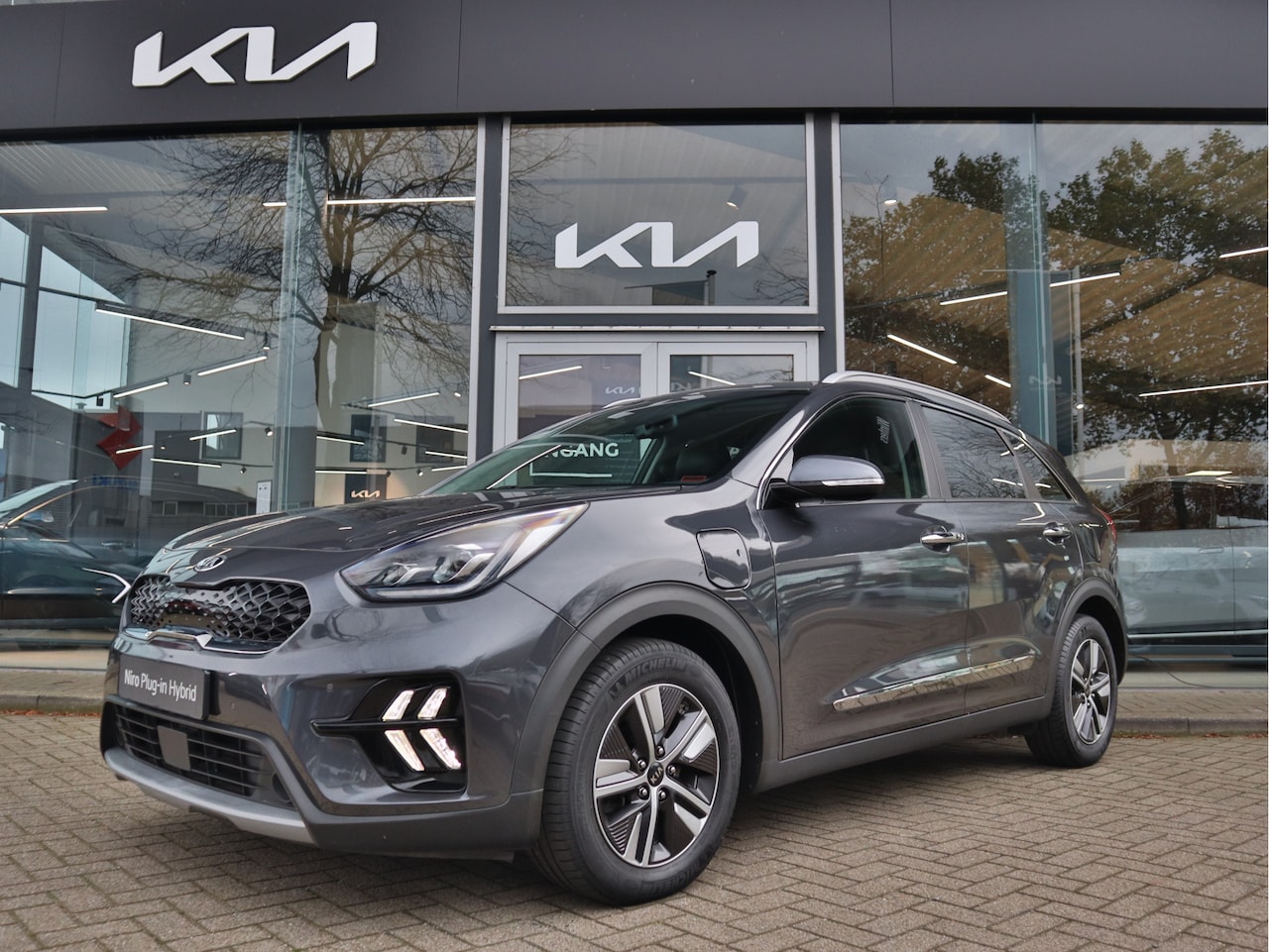 Kia Niro - 1.6 GDi PHEV ExecutiveLine Navi+BT+Cam ECC-Airco Adapt.Cr.Control Stoel+Stuur.Verw 16"LMV - AutoWereld.nl