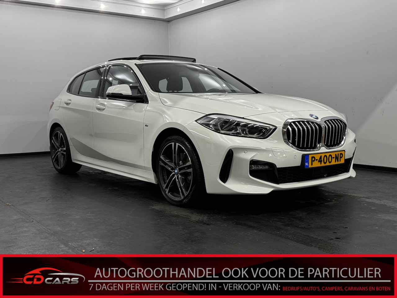 BMW 1-serie - 118i High Executive M SPORT Half leder, Camera, Schuifdak, Navi, Cruise control adaptief - AutoWereld.nl