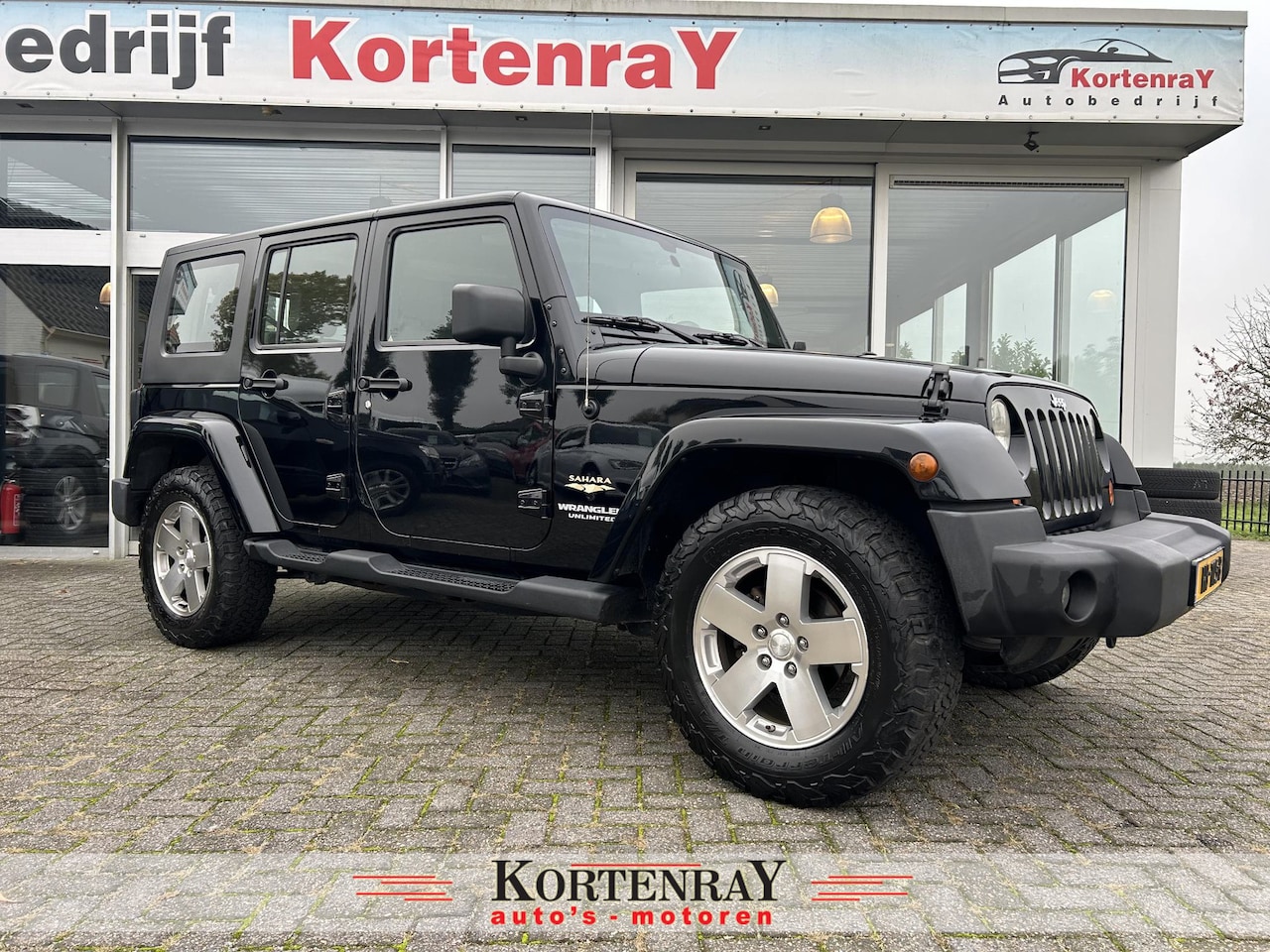 Jeep Wrangler Unlimited - 3.8 Sahara Black Monster/automaat/airco/cruise control/nieuwstaat - AutoWereld.nl